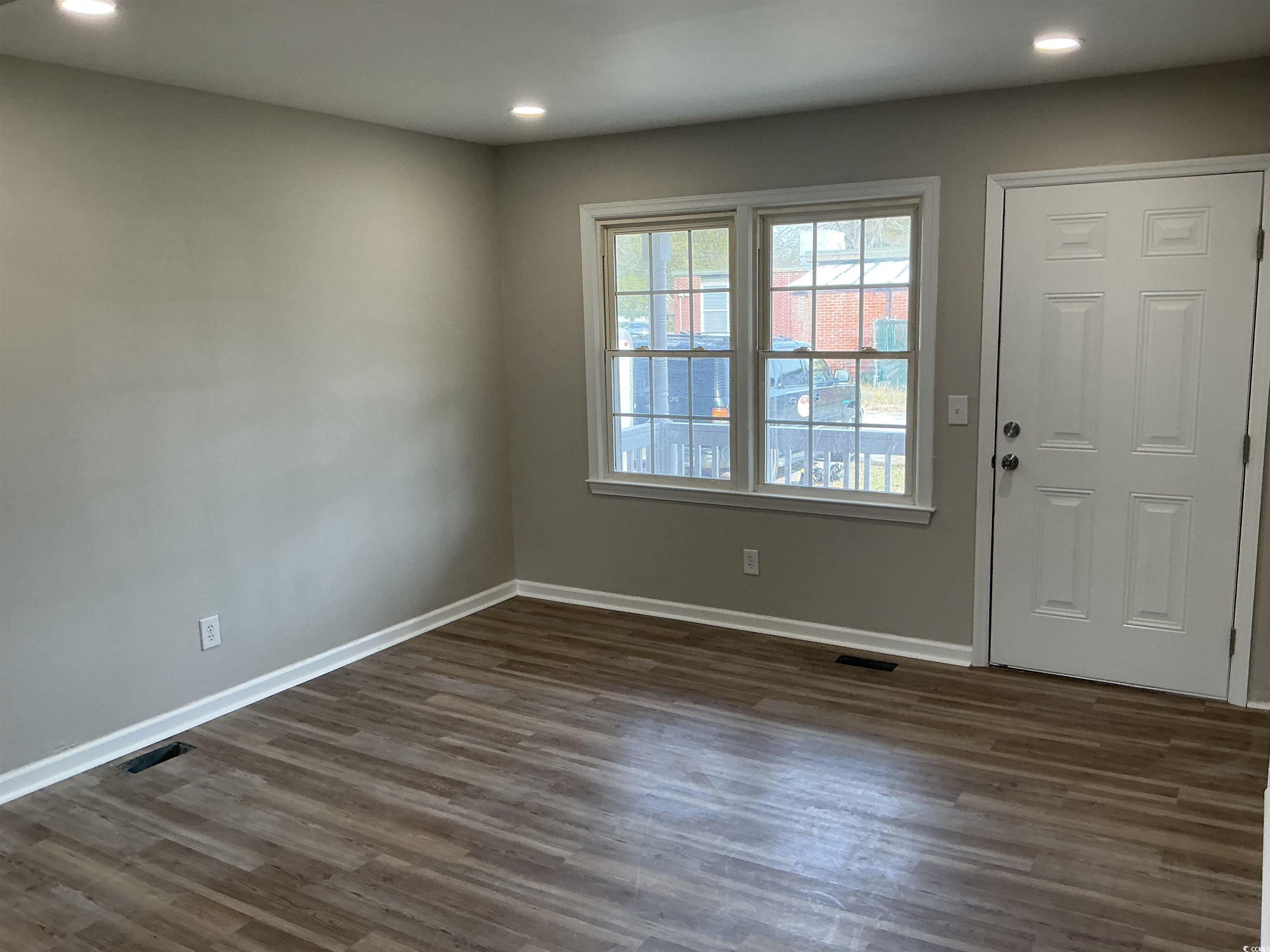 105 Mace Court Latta, SC 29565 - Photo 8 of 12 Foyer with recessed lighting and dark wood-style flooring