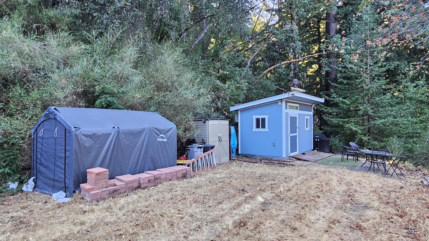 20245 Gist Road Los Gatos, CA 95033 - Photo 7 of 13 a view of a barn in the middle of a yard
