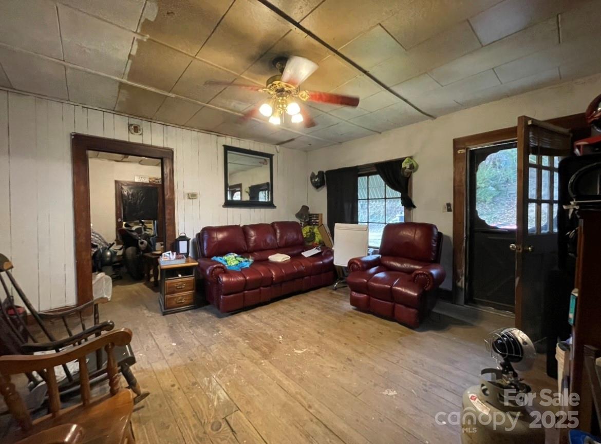 130 Lookout Road Asheville, NC 28804 - Photo 13 of 18 a living room with furniture a chandelier