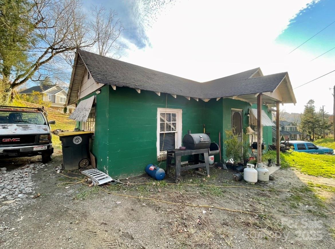 130 Lookout Road Asheville, NC 28804 - Photo 18 of 18 a view of a chairs and tables in the patio