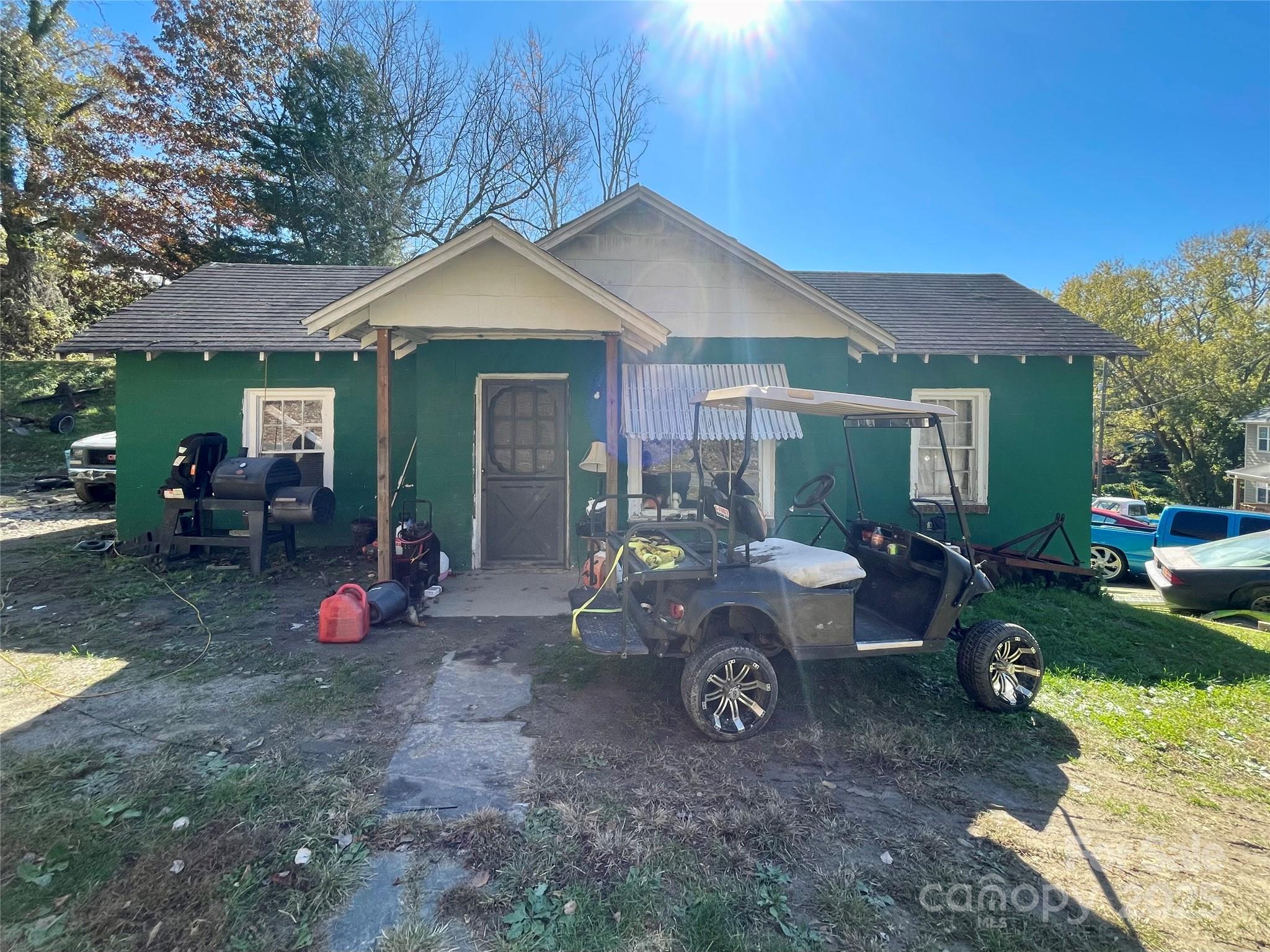 130 Lookout Road Asheville, NC 28804 - Photo 2 of 18 a view of a house with backyard and sitting area