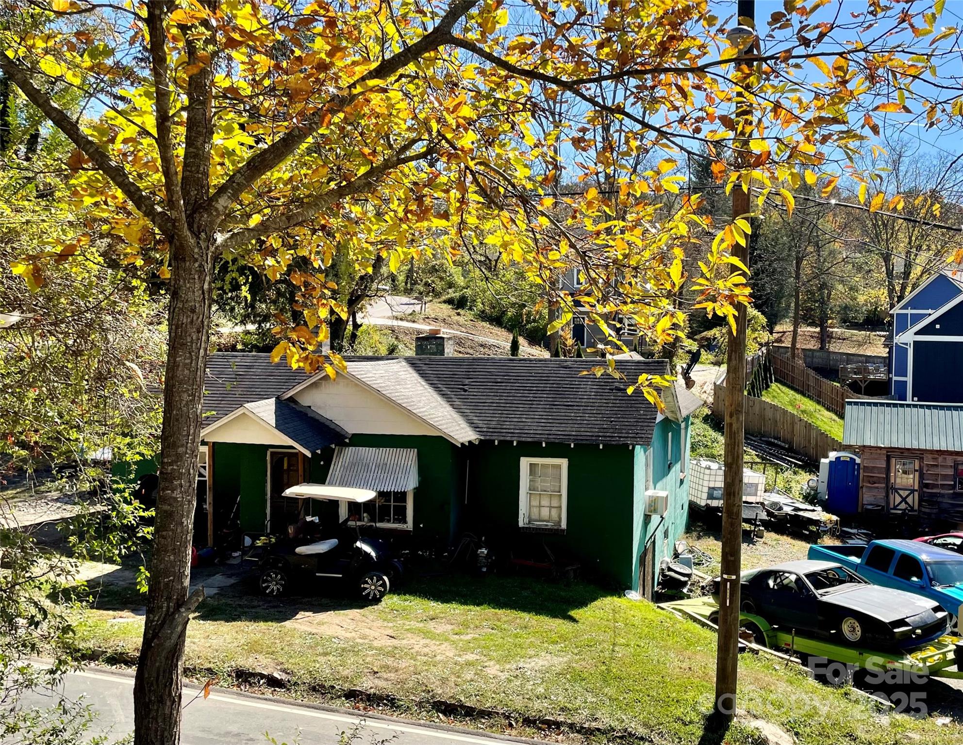 130 Lookout Road Asheville, NC 28804 - Photo 3 of 18 a front view of a house with a yard