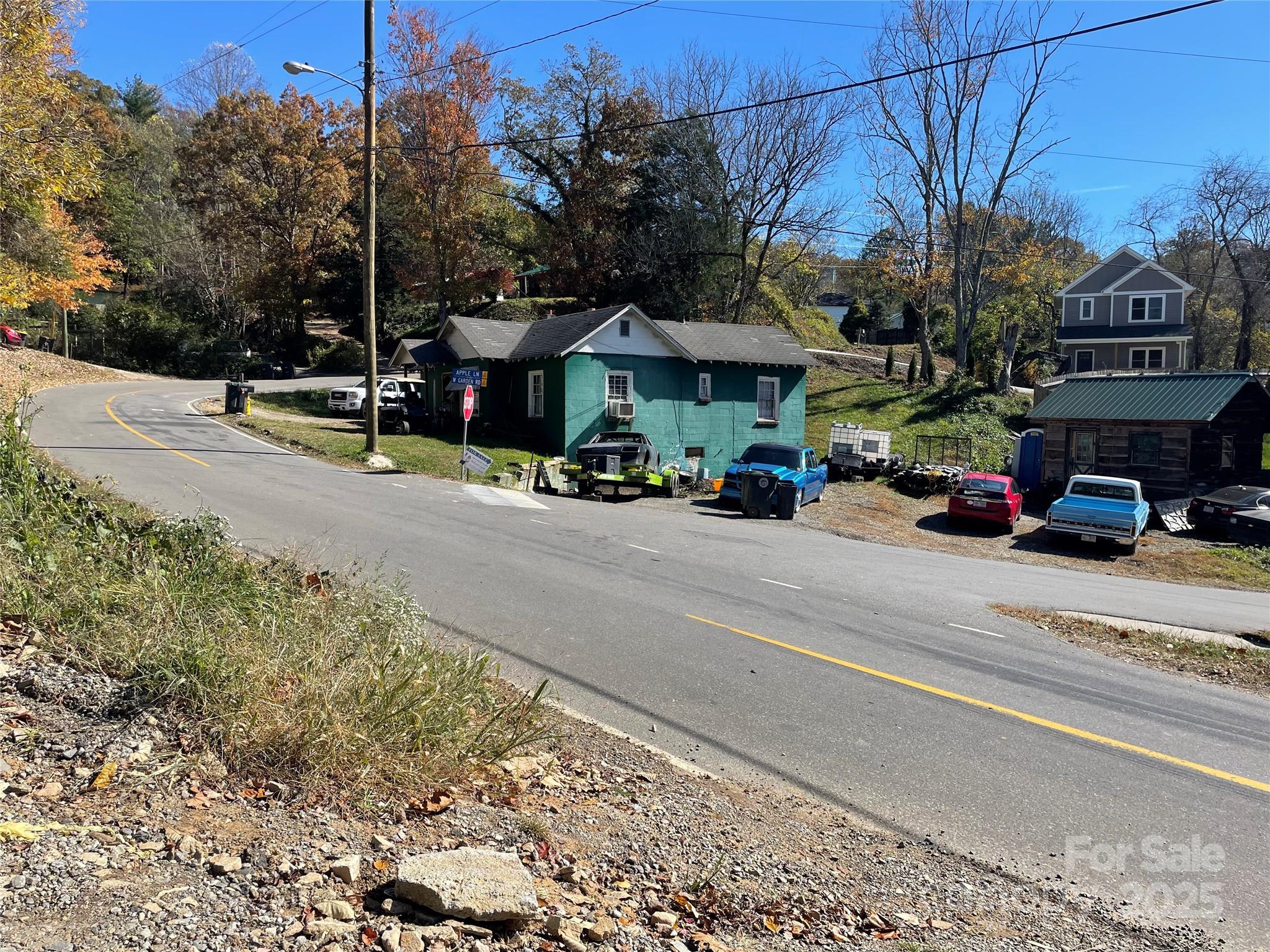 130 Lookout Road Asheville, NC 28804 - Photo 5 of 18 a view of street with parked cars
