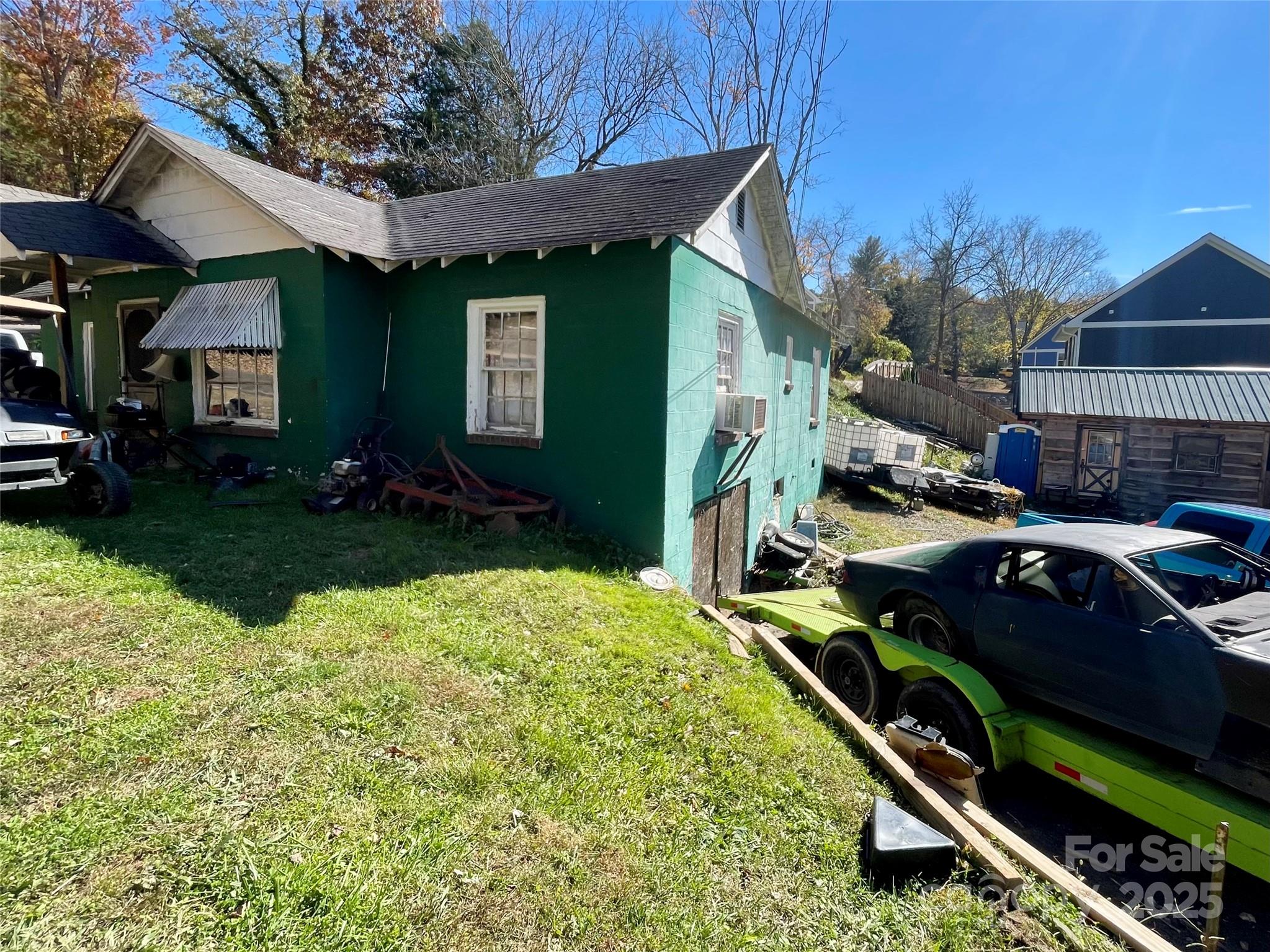 130 Lookout Road Asheville, NC 28804 - Photo 8 of 18 a car parked in front of a house