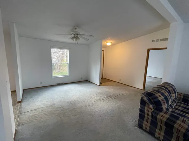 an empty room with windows