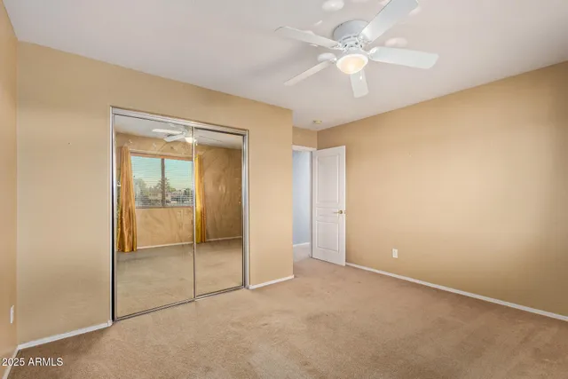 a bathroom with a bathtub and a toilet