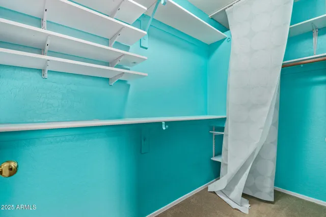 a view of a swimming pool with an ocean view