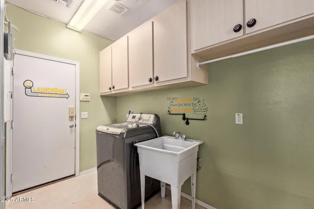 a view of a street with a cars parked