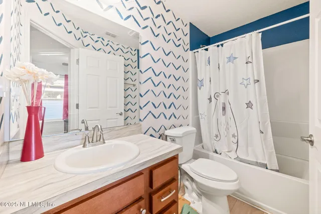 a bed room with a bed and a window