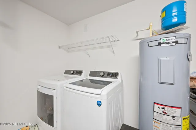 a view of a patio with a table chairs and backyard