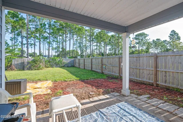 a house view with a garden space