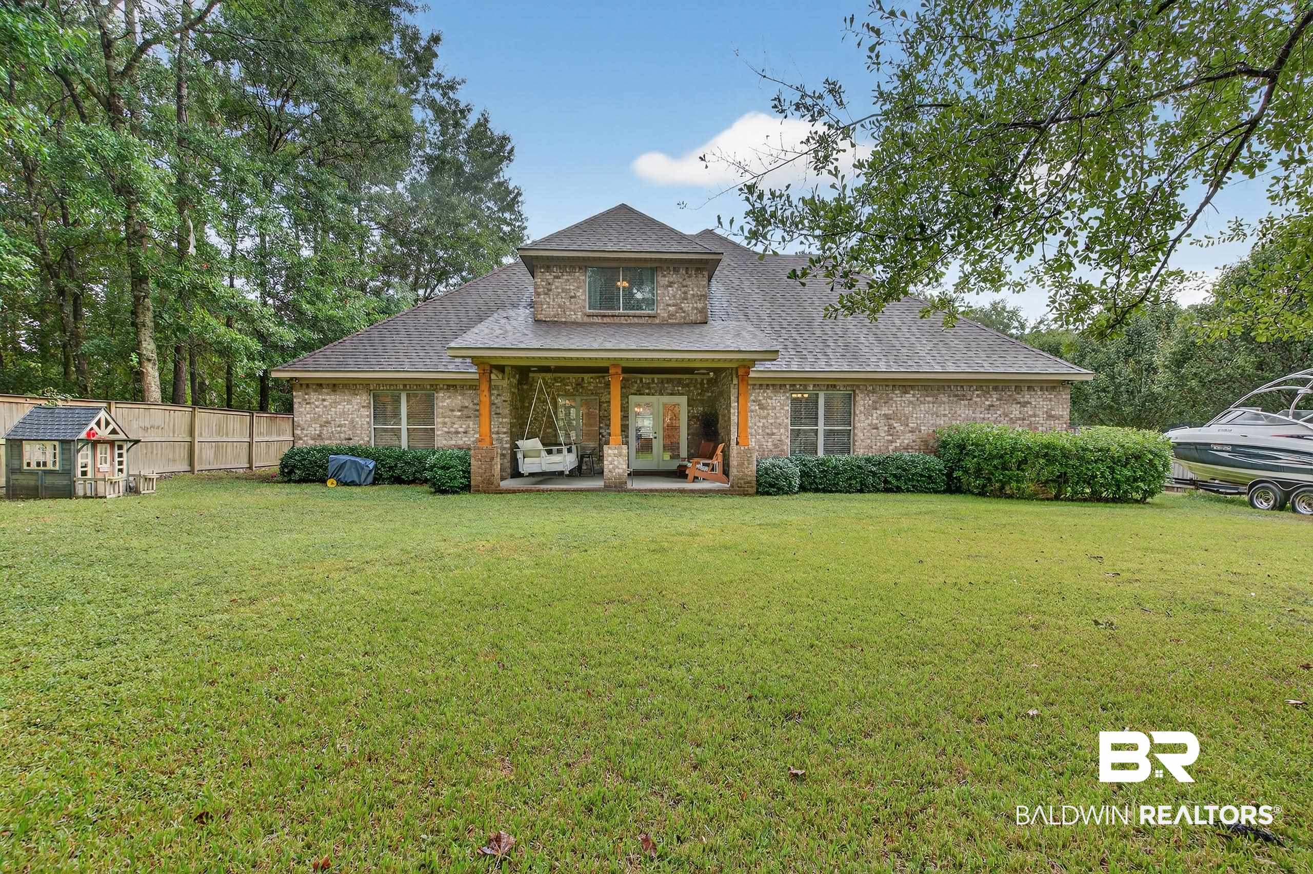 5517 Rabbit Creek Drive Theodore, AL 36582 - Photo 28 of 33 Rear view of property with a shingled roof, a patio, and brick siding