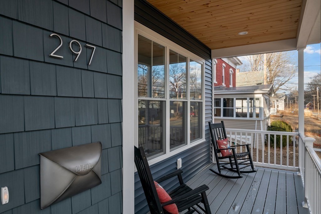 297 Riverside Drive Northampton, MA 01062 - Photo 2 of 32 a view of a porch with furniture and next to a window