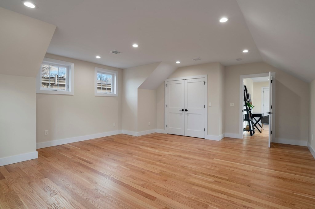 297 Riverside Drive Northampton, MA 01062 - Photo 27 of 32 a view of an empty room with wooden floor