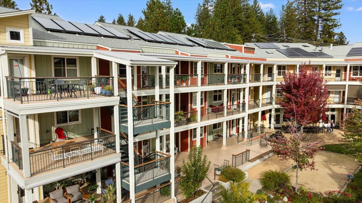 800 Freeman Lane, Unit 105 Grass Valley, CA 95949 - Photo 37 of 48 a view of a large building with a lot of windows
