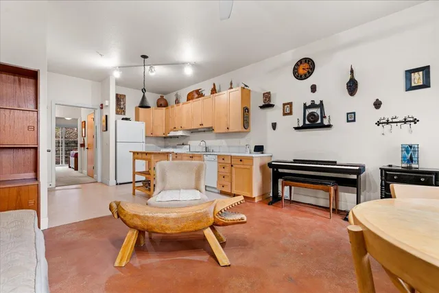 a living room with furniture and a table