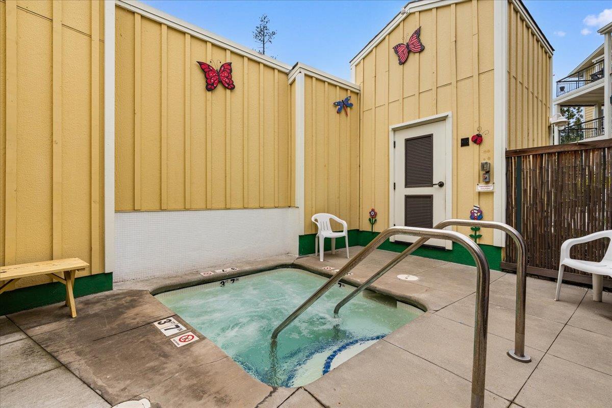 800 Freeman Lane, Unit 105 Grass Valley, CA 95949 - Photo 42 of 48 a backyard of a house with table and chairs