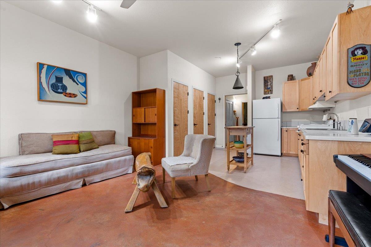 800 Freeman Lane, Unit 105 Grass Valley, CA 95949 - Photo 5 of 48 a living room with furniture and a large window