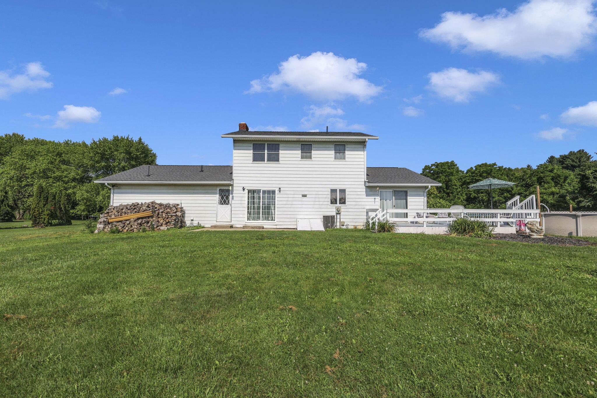 6605 Lancaster Road Hebron, OH 43025 - Photo 39 of 53 A spacious backyard ideal for firepits, lawn games, and unforgettable gatherings with family and friends.