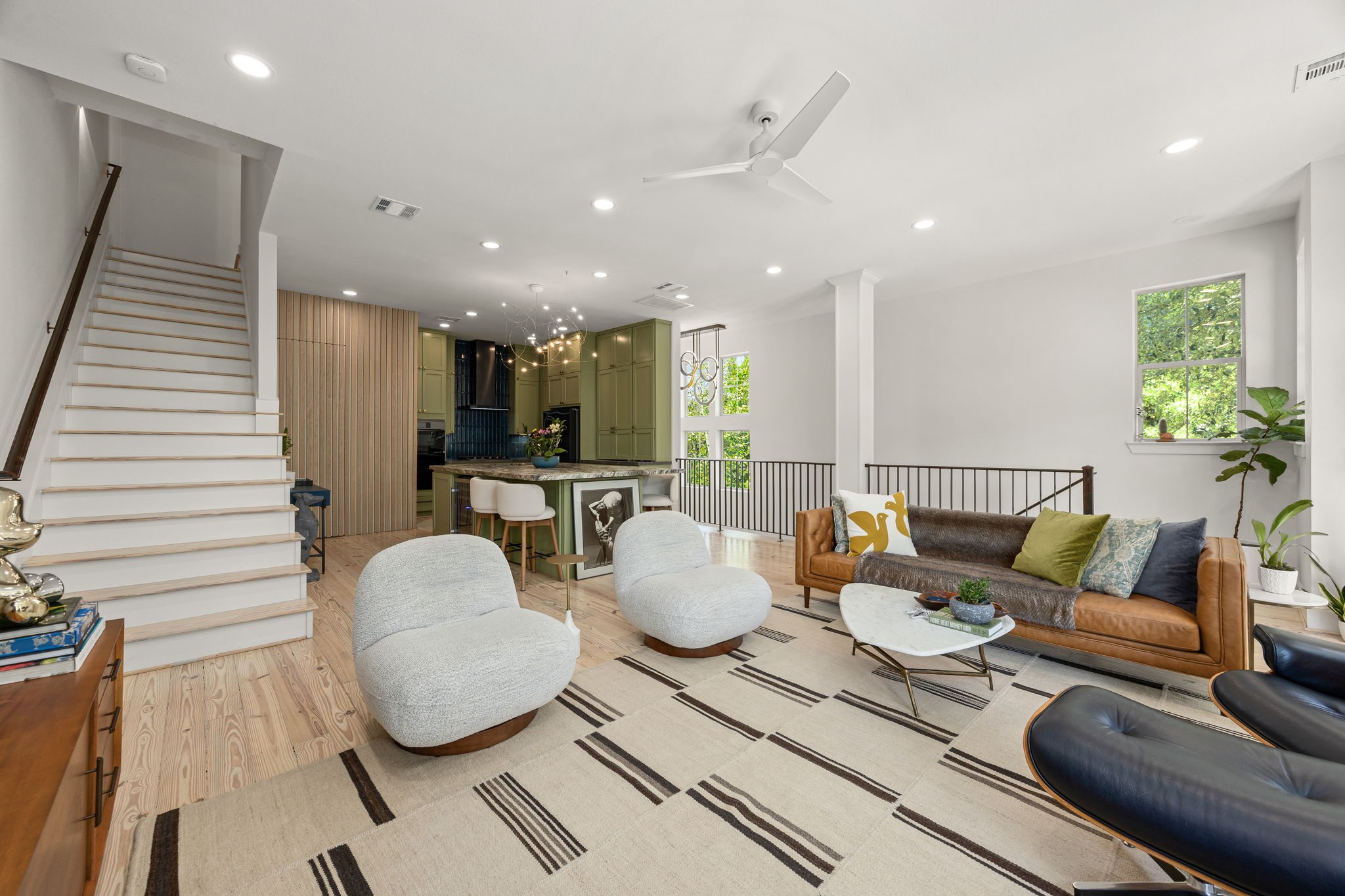 523 Fowler Street Houston, TX 77007 - Photo 11 of 39 a living room with furniture and a large window