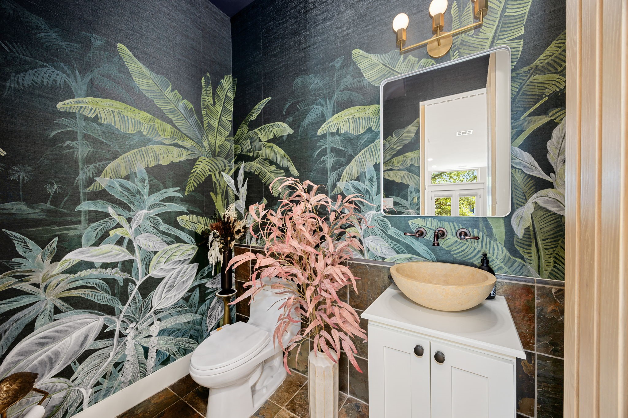 523 Fowler Street Houston, TX 77007 - Photo 19 of 39 a vase of flowers sitting on a table