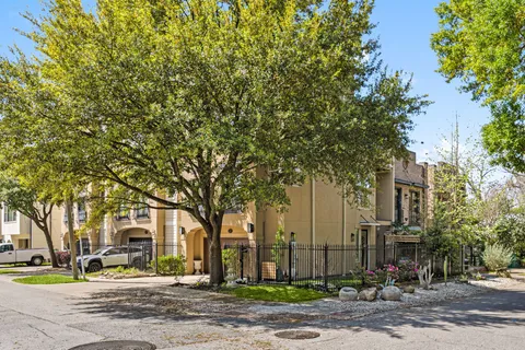 a front view of a building with street view