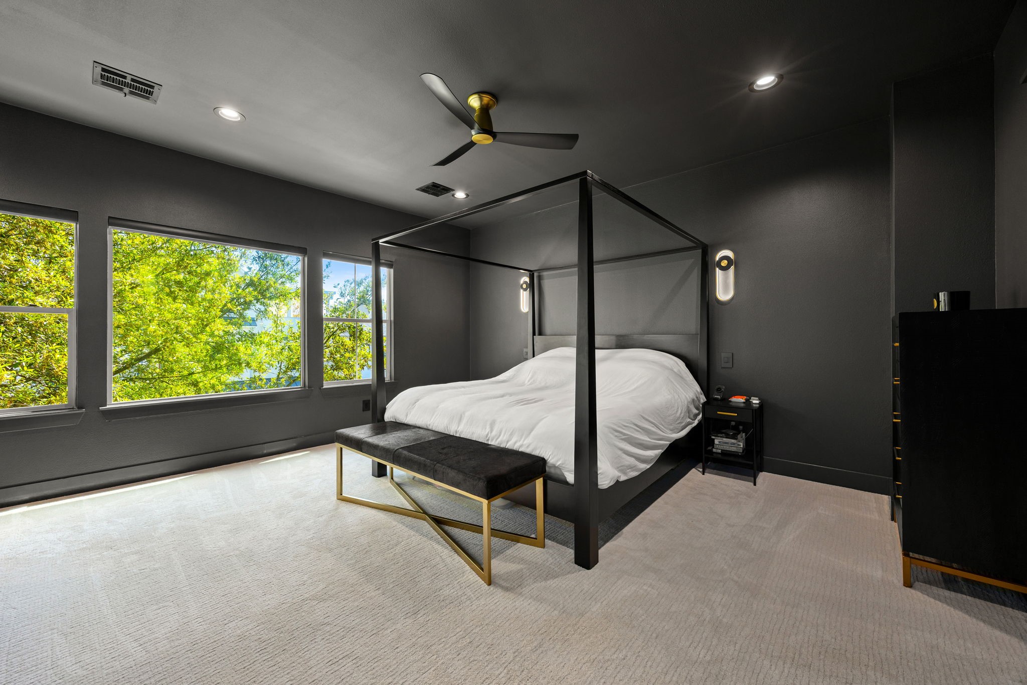 523 Fowler Street Houston, TX 77007 - Photo 22 of 39 a bed sitting in a room next to a window