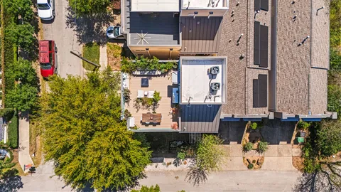 an aerial view of a city with lots of residential buildings
