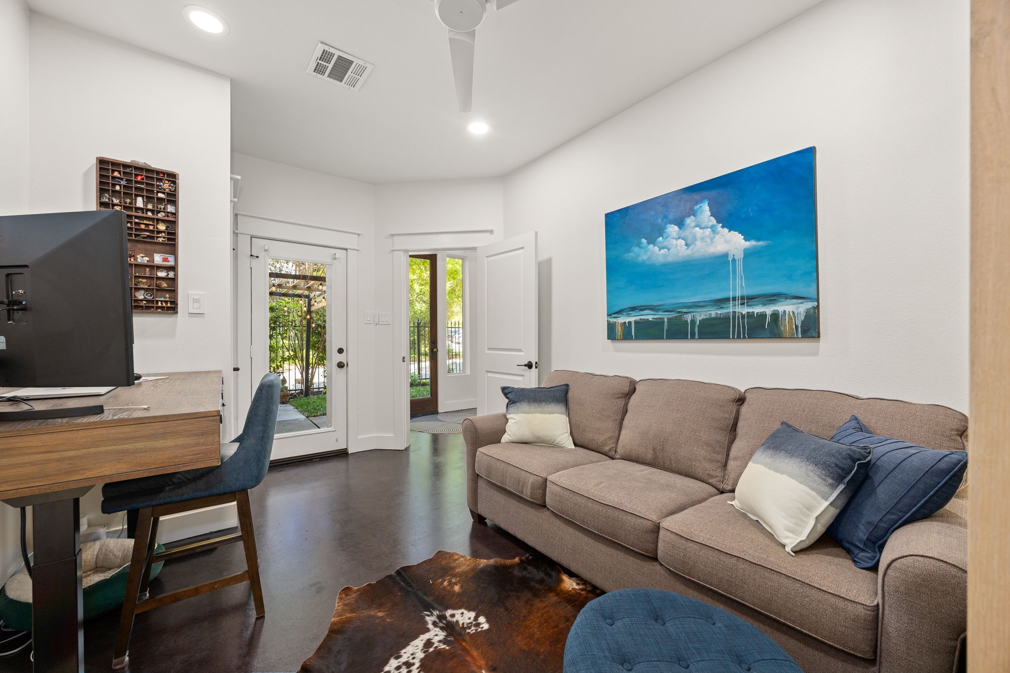 523 Fowler Street Houston, TX 77007 - Photo 7 of 39 a living room with furniture and a flat screen tv