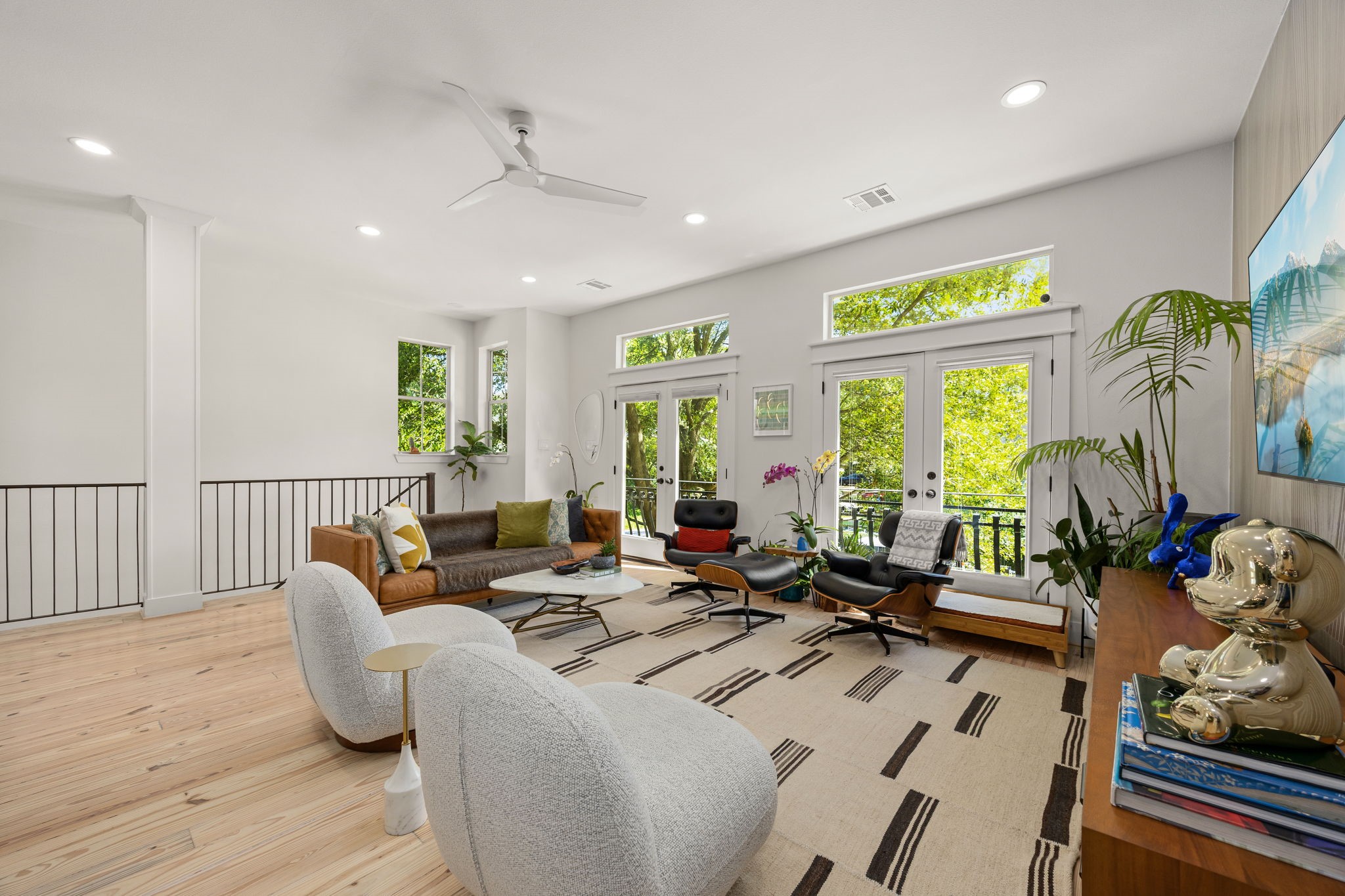 523 Fowler Street Houston, TX 77007 - Photo 10 of 39 a living room with furniture and a large window