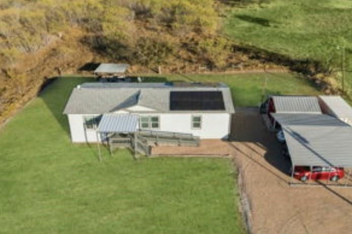 a view of a chairs and table on the deck