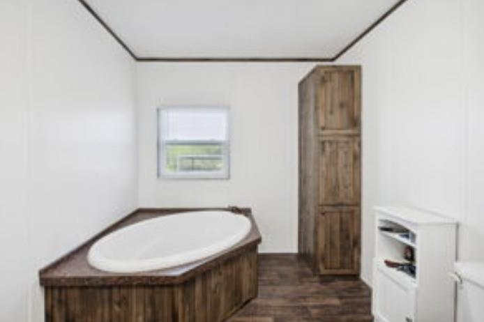 10240 Norrell Road Venus, TX 76084 - Photo 11 of 19 a bathroom with a bathtub and shower