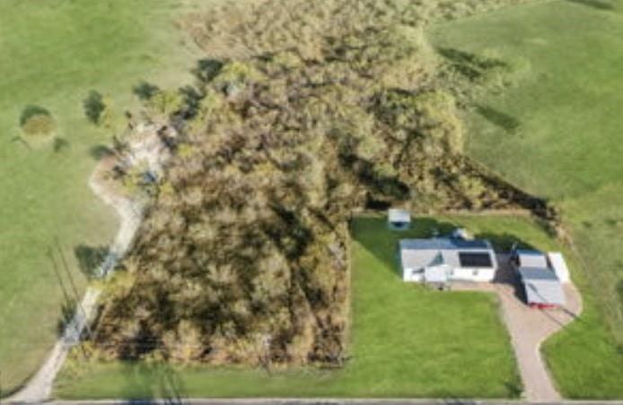 10240 Norrell Road Venus, TX 76084 - Photo 2 of 19 view of a yard with brick wall