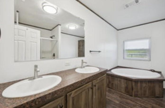 10240 Norrell Road Venus, TX 76084 - Photo 10 of 19 a bathroom with a double vanity sink and a mirror