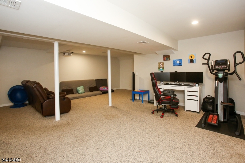 207 Patriots Road Morris Plains, NJ 07950 - Photo 18 of 25 a view of a room with gym equipment