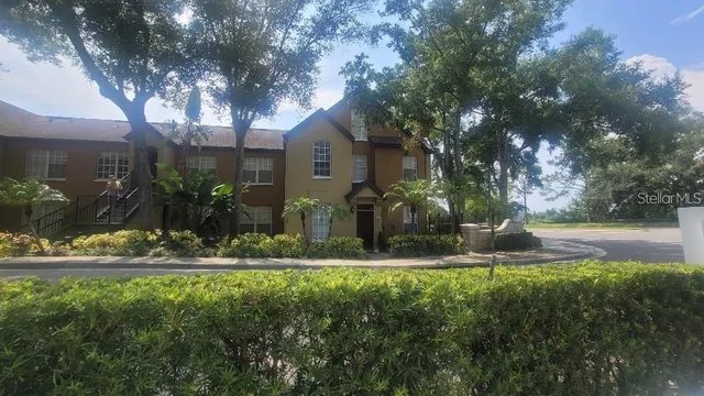 a view of a yard in front of a house