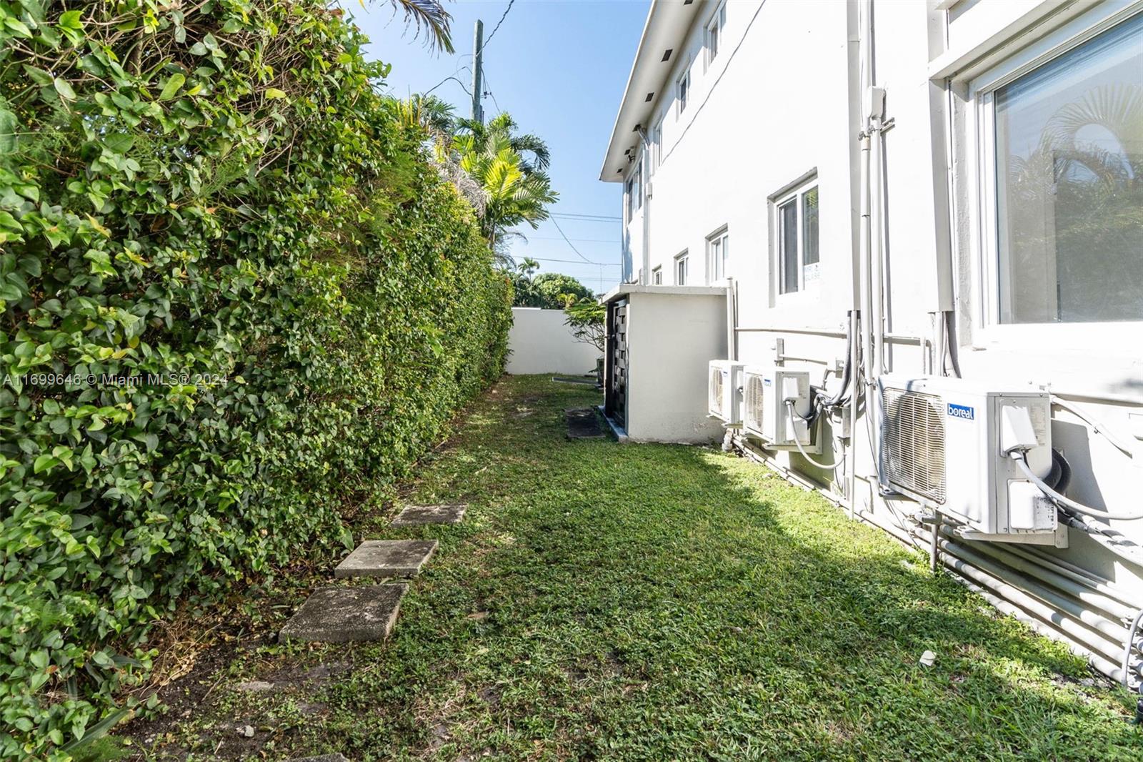 2190 Southwest 14th Terrace, Unit 1 Miami, FL 33145 - Photo 12 of 13 a view of a back yard of the house