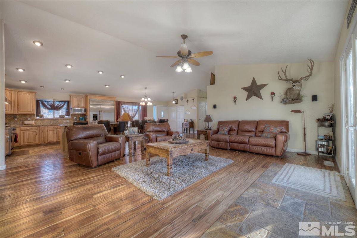 2160 Antelope Valley Road Reno, NV 89506 - Photo 5 of 25 a living room with furniture kitchen view and a chandelier