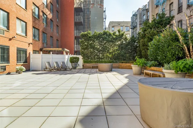 a view of a terrace with sitting area