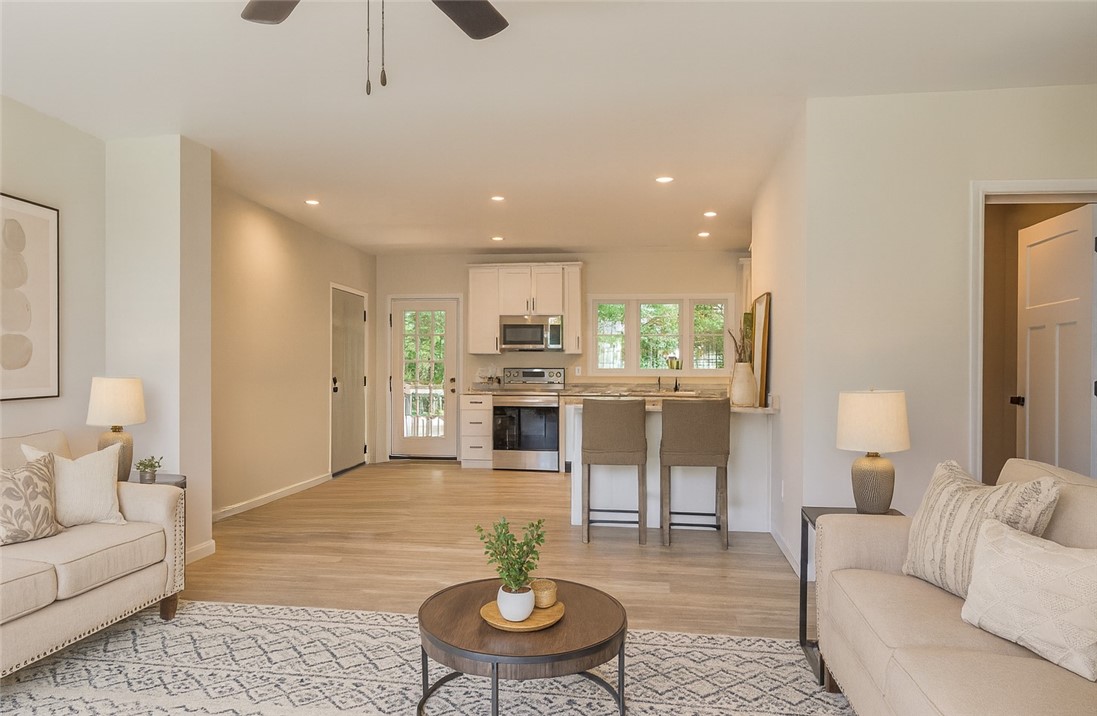 240 Plum Point Road, Unit 13 Milo, NY 14842 - Photo 8 of 24 Living Room/Kitchen- virtually staged