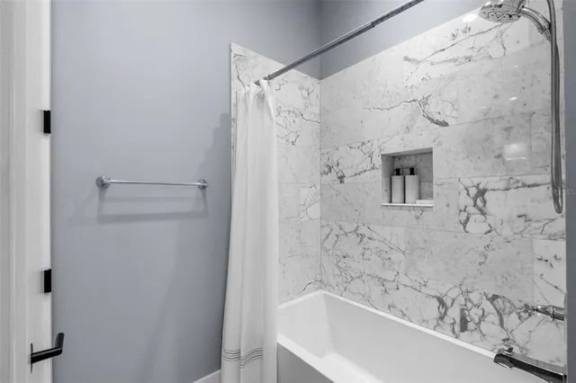 a view of a backyard with a small cabin