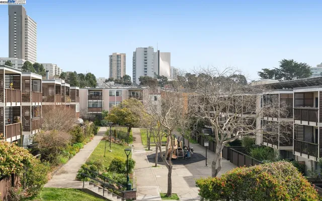 a view of a city with tall buildings