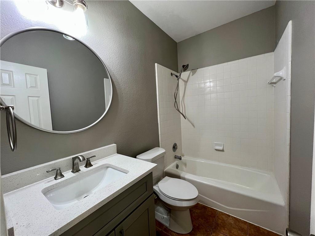 1706 Winners Ribbon Circle Pflugerville, TX 78660 - Photo 11 of 21 a bathroom with a sink and a mirror