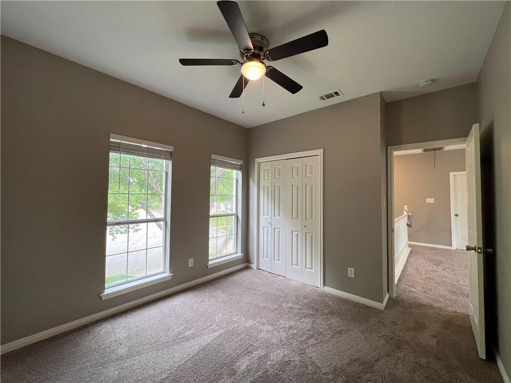 1706 Winners Ribbon Circle Pflugerville, TX 78660 - Photo 12 of 21 a view of an empty room with a window