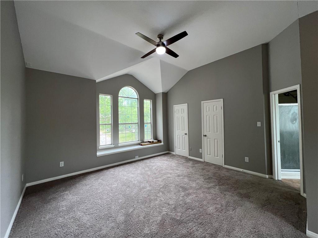 1706 Winners Ribbon Circle Pflugerville, TX 78660 - Photo 16 of 21 a view of a livingroom with a ceiling fan and window