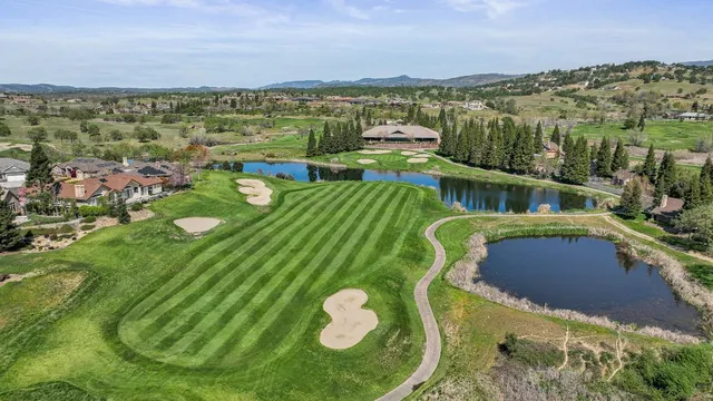 a view of a lake with a yard