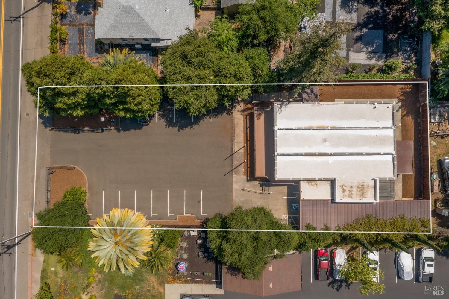 21249 Geyserville Avenue Geyserville, CA 95441 - Photo 13 of 13 a front view of a house with a garden