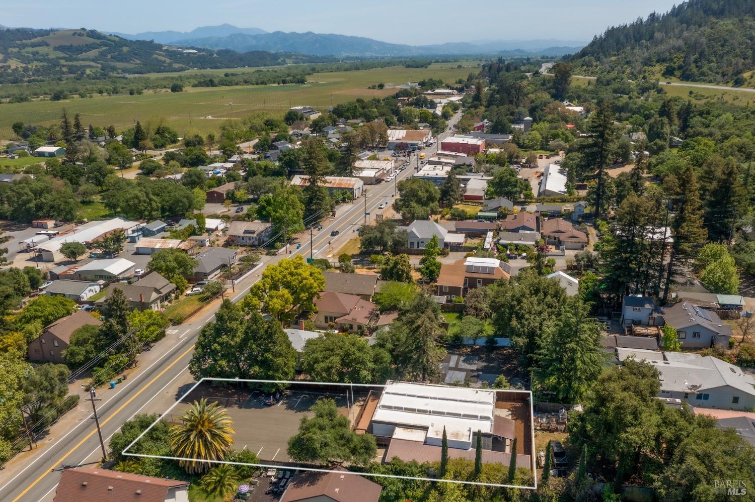 21249 Geyserville Avenue Geyserville, CA 95441 - Photo 3 of 13 an aerial view of residential building with outdoor space and lake view