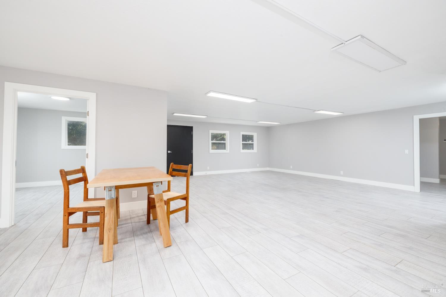 21249 Geyserville Avenue Geyserville, CA 95441 - Photo 5 of 13 a view of dining room with furniture and wooden floor