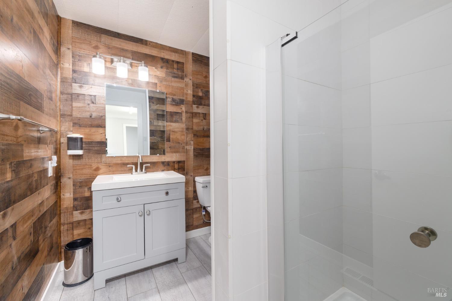 21249 Geyserville Avenue Geyserville, CA 95441 - Photo 9 of 13 a view of bathroom with a sink and mirror